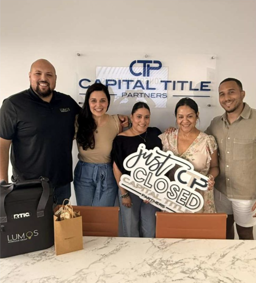 Just closed — celebrating at Capital Title Partners